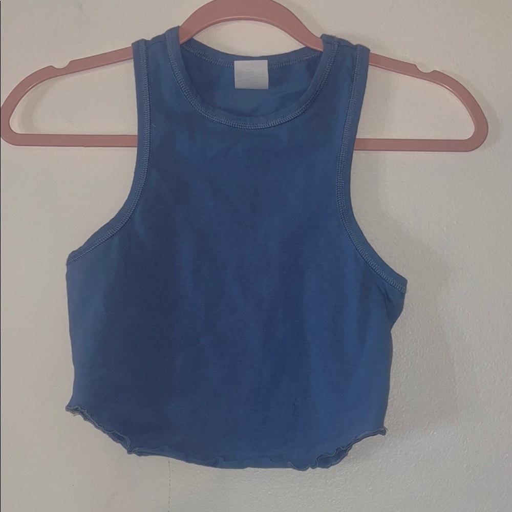 TSC Miami Blue Crop Top with curly edges